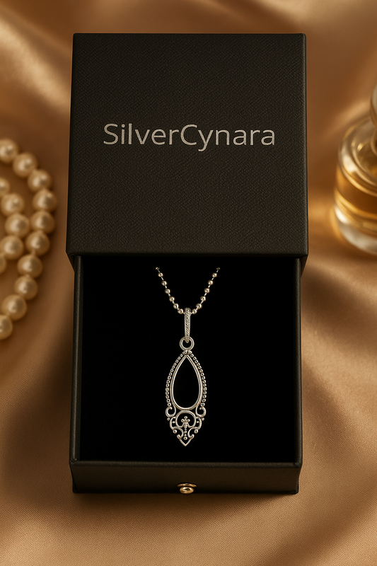 Sterling Silver Openwork Marquise Pendant – Elegant Detailing